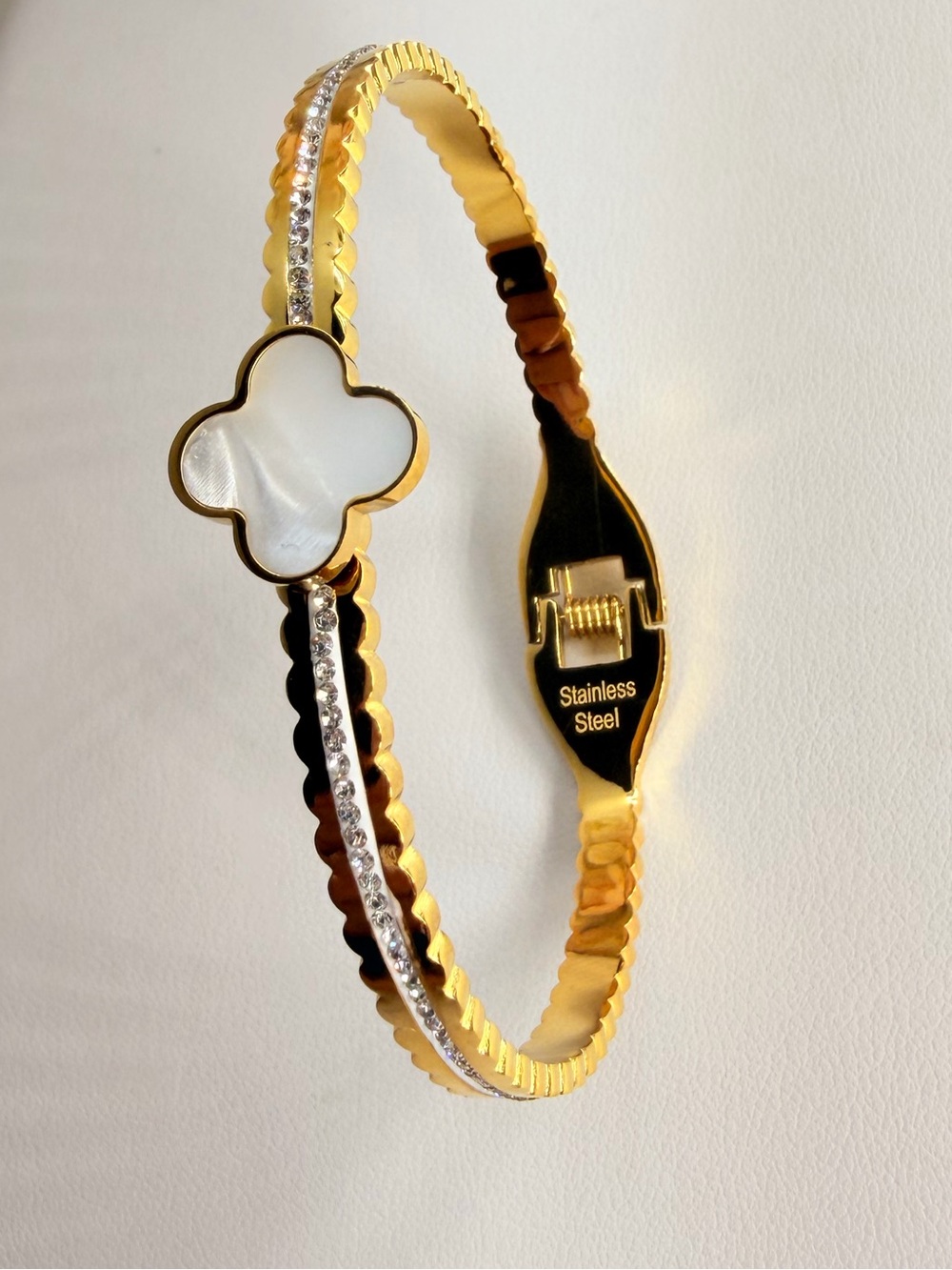 Stainless steel Gold Bangle Bracelet with White Mother-of-Pearl Clover Accent